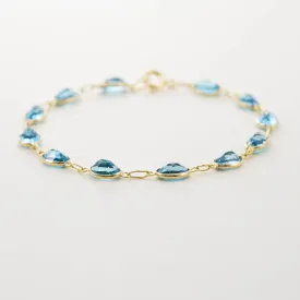 9ct Yellow Gold Bezel Set Blue Topaz Bracelet