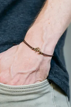 Men's bracelet with bronze Om charm, brown cord