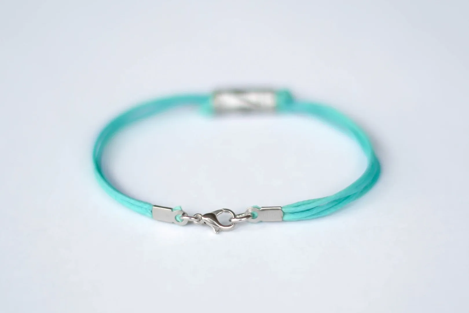 Turquoise cord bracelet for men, silver tube charm for him